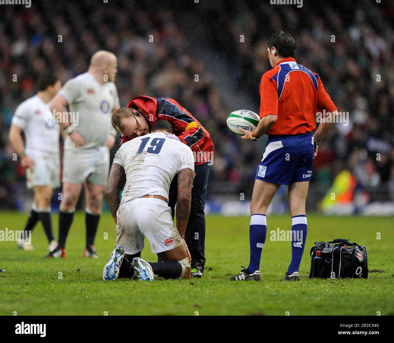 Courtney Lawes of England receives medical attention during the RBS 6 Nations match between Ireland and England at the Aviva Stadium, Dublin on Sunday Stock Photo