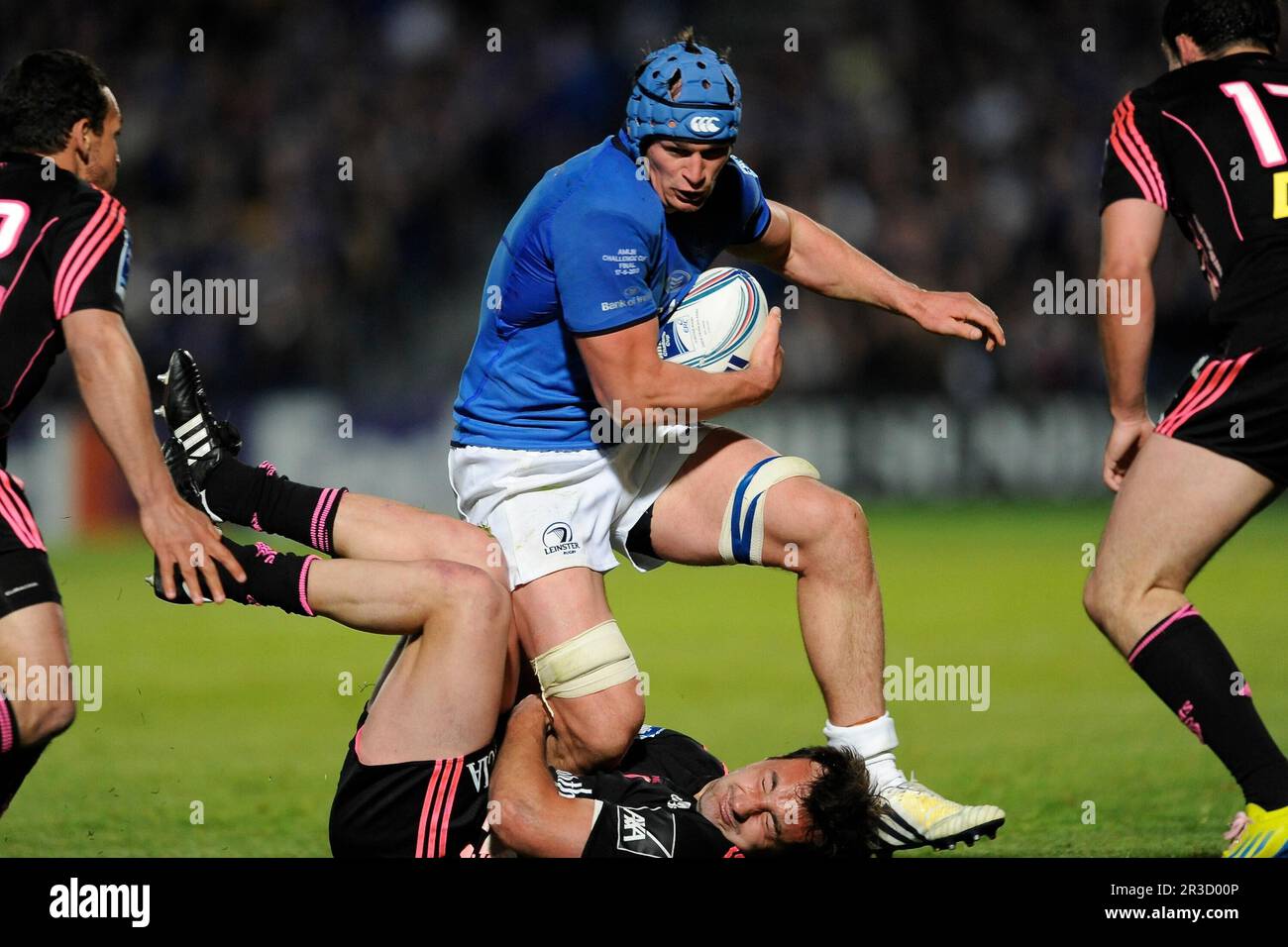 Rhys Ruddock of Leinster charges through Jérémy Sinzelle of Stade Francais during the Amlin Challenge Cup Final between Leinster Rugby and Stade Franc Stock Photo