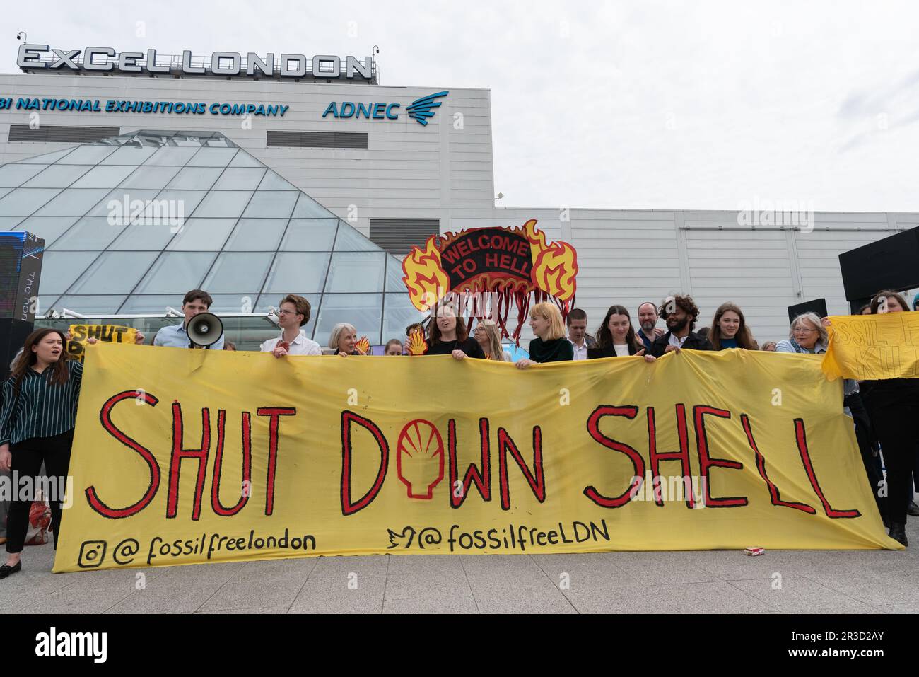 London, UK. 23 May, 2023. Climate activists protest outside the Annual General Meeting of oil giant Shell at the Excel Centre in docklands, calling on the company to drop plans to expand extraction of the fossil fuels responsible for global heating if we are to meet Paris climate targets on CO2 reduction and temperature increases. The company has enjoyed large profits while consumers faced record energy prices. Credit: Ron Fassbender/Alamy Live News Stock Photo