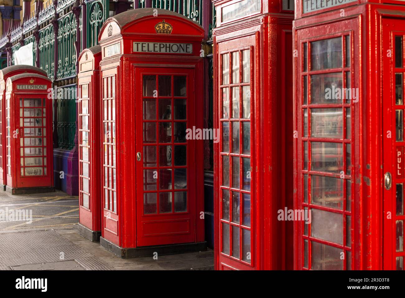 A row of iconic British red telephone boxes at Smithfield meat market in London Stock Photo