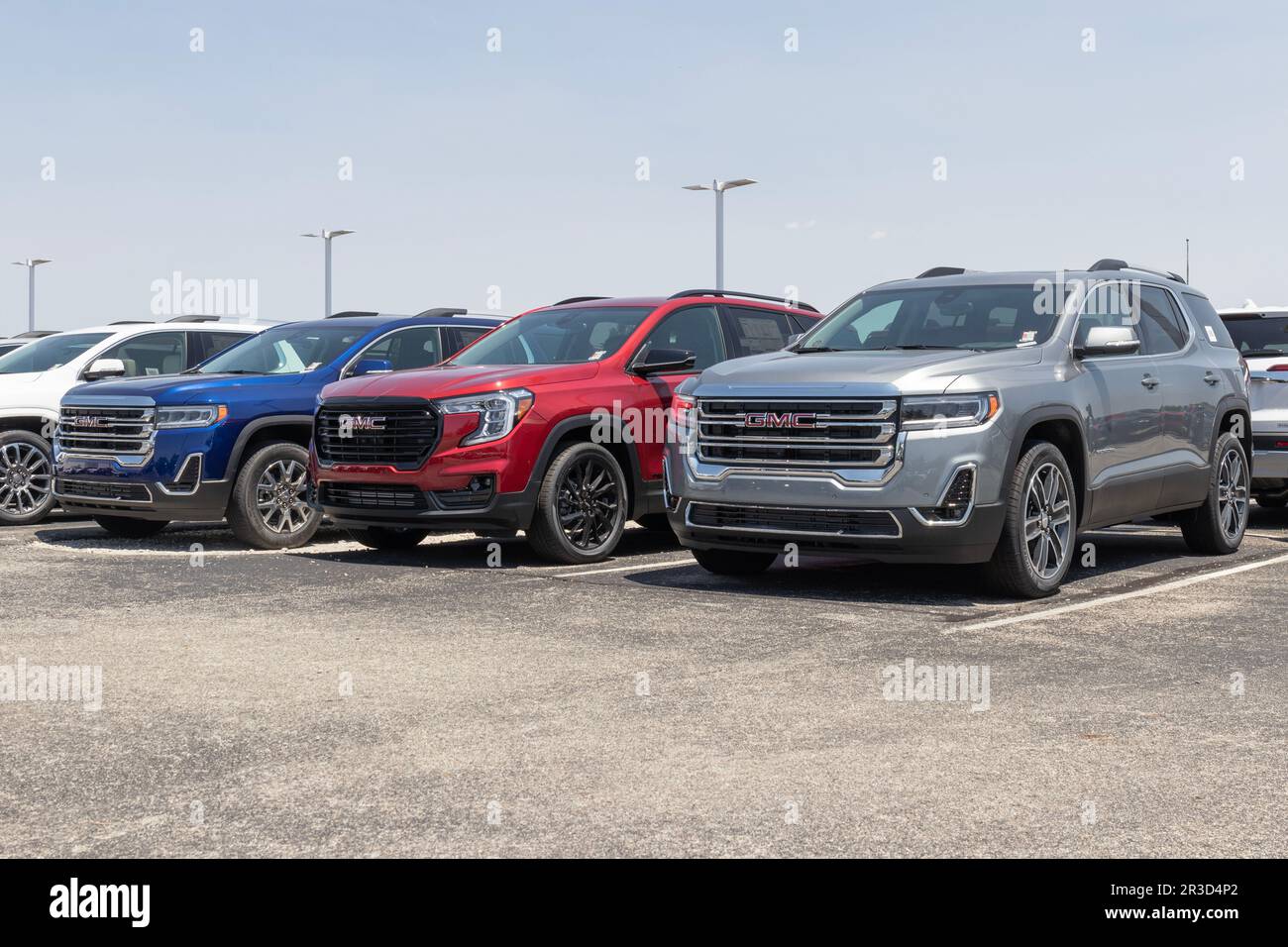 Fishers Circa May 2023 GMC Acadia SUV display at a dealership. GMC offers the Acadia in SLE