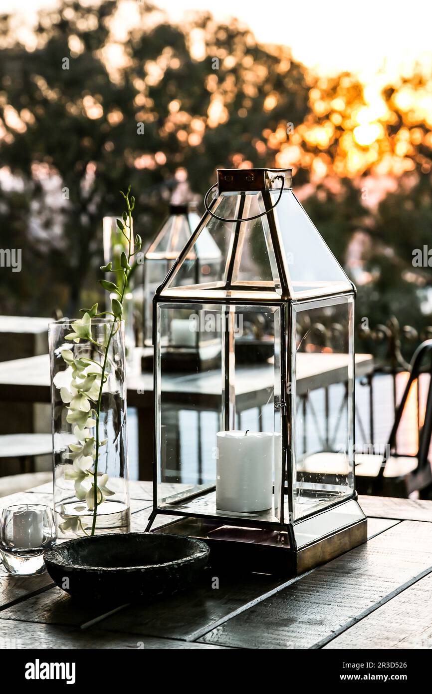 Display candles and glass lanterns for outdoor decor Stock Photo