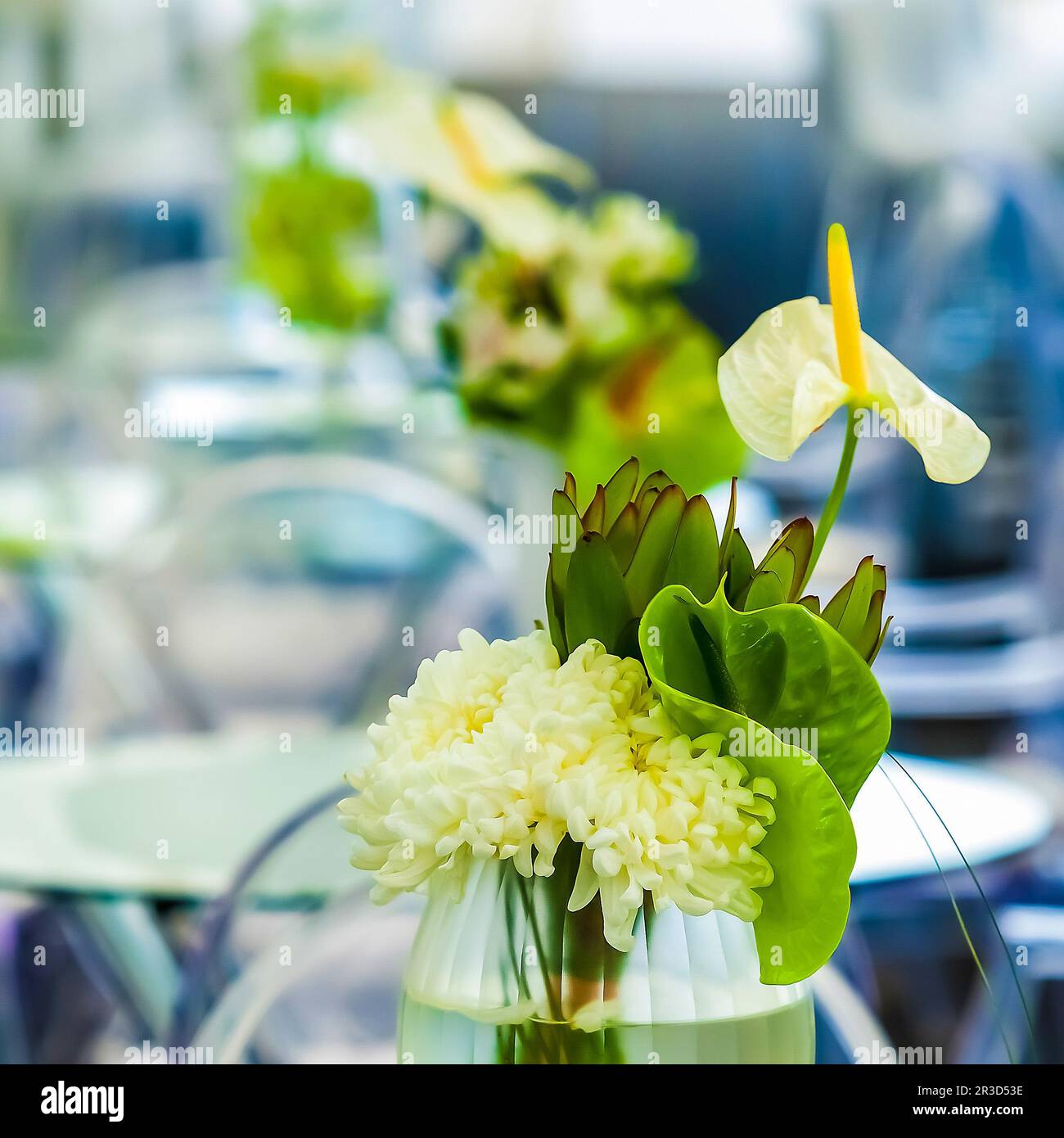 White flowers on a table setting for event or party Stock Photo