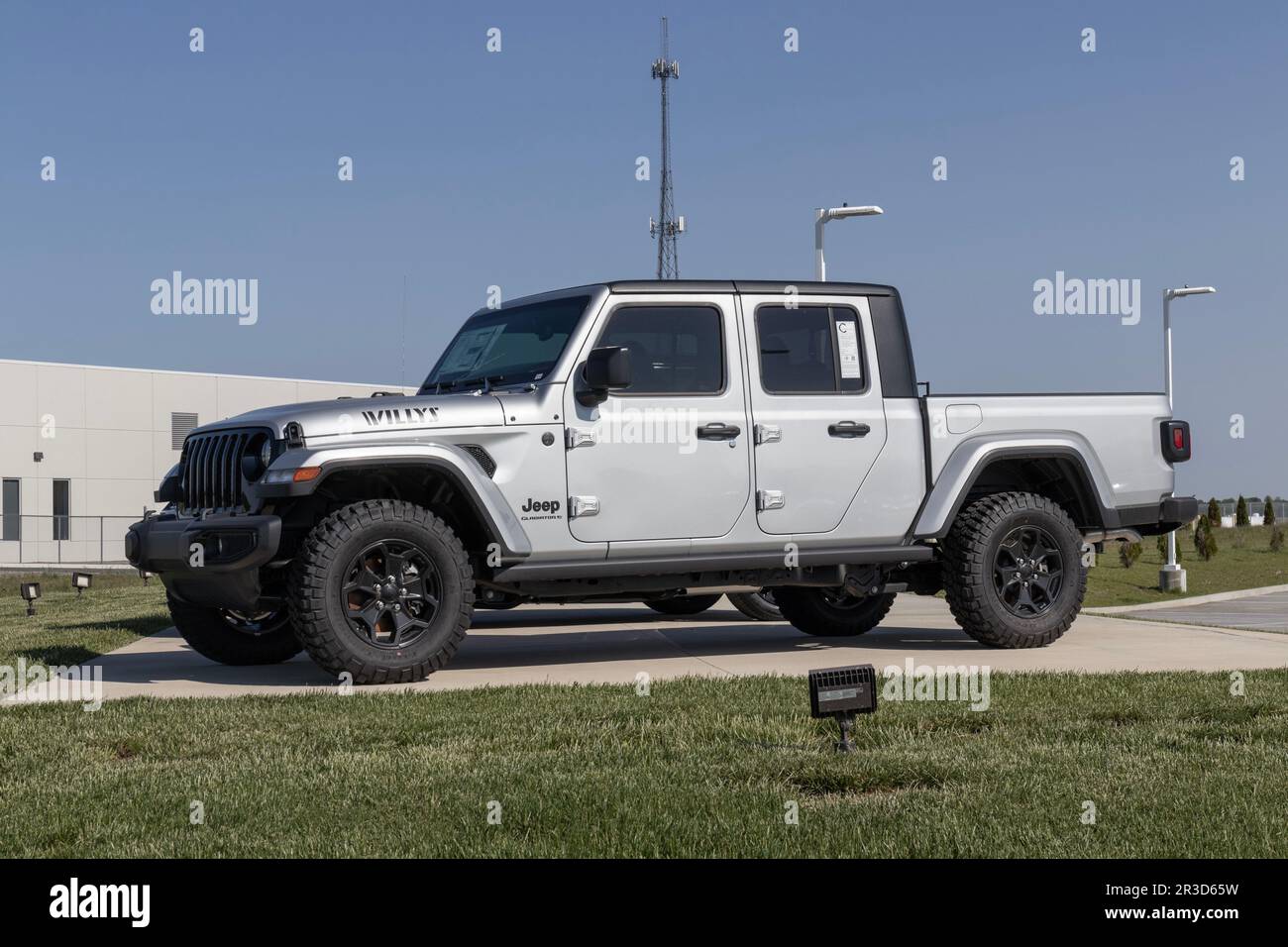 Tipton - Circa May 2023: Jeep Gladiator display at a Stellantis dealer. The Jeep Gladiator models include the Sport, Willys, Rubicon and Mojave. Stock Photo