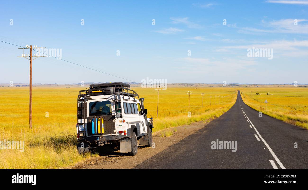 Old Land Rover Defender in the countryside of South Africa Stock Photo