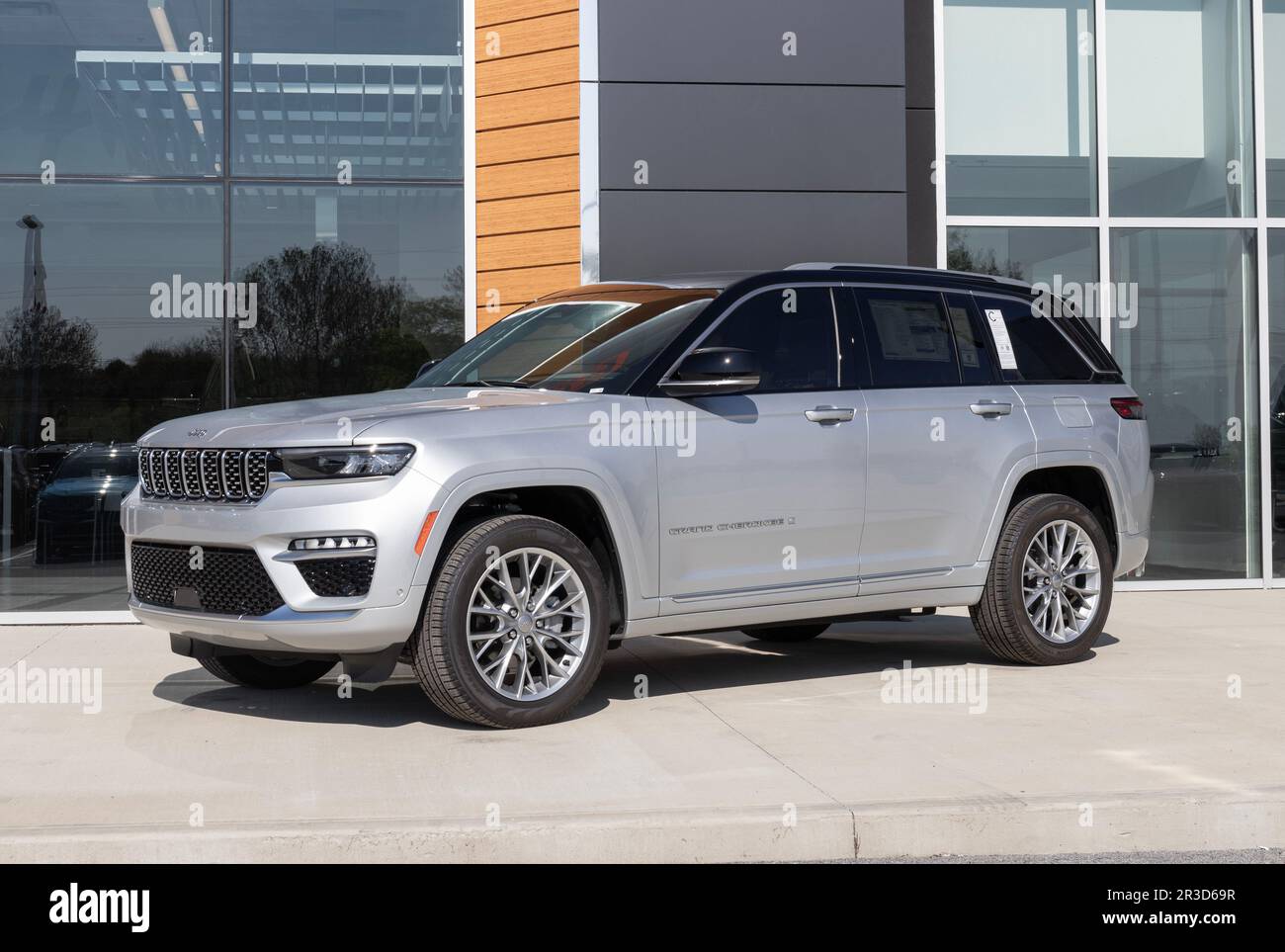 Tipton - Circa May 2023: Jeep Grand Cherokee display at a dealership. Jeep offers the Grand Cherokee in Laredo, Limited, and Trailhawk models. Stock Photo