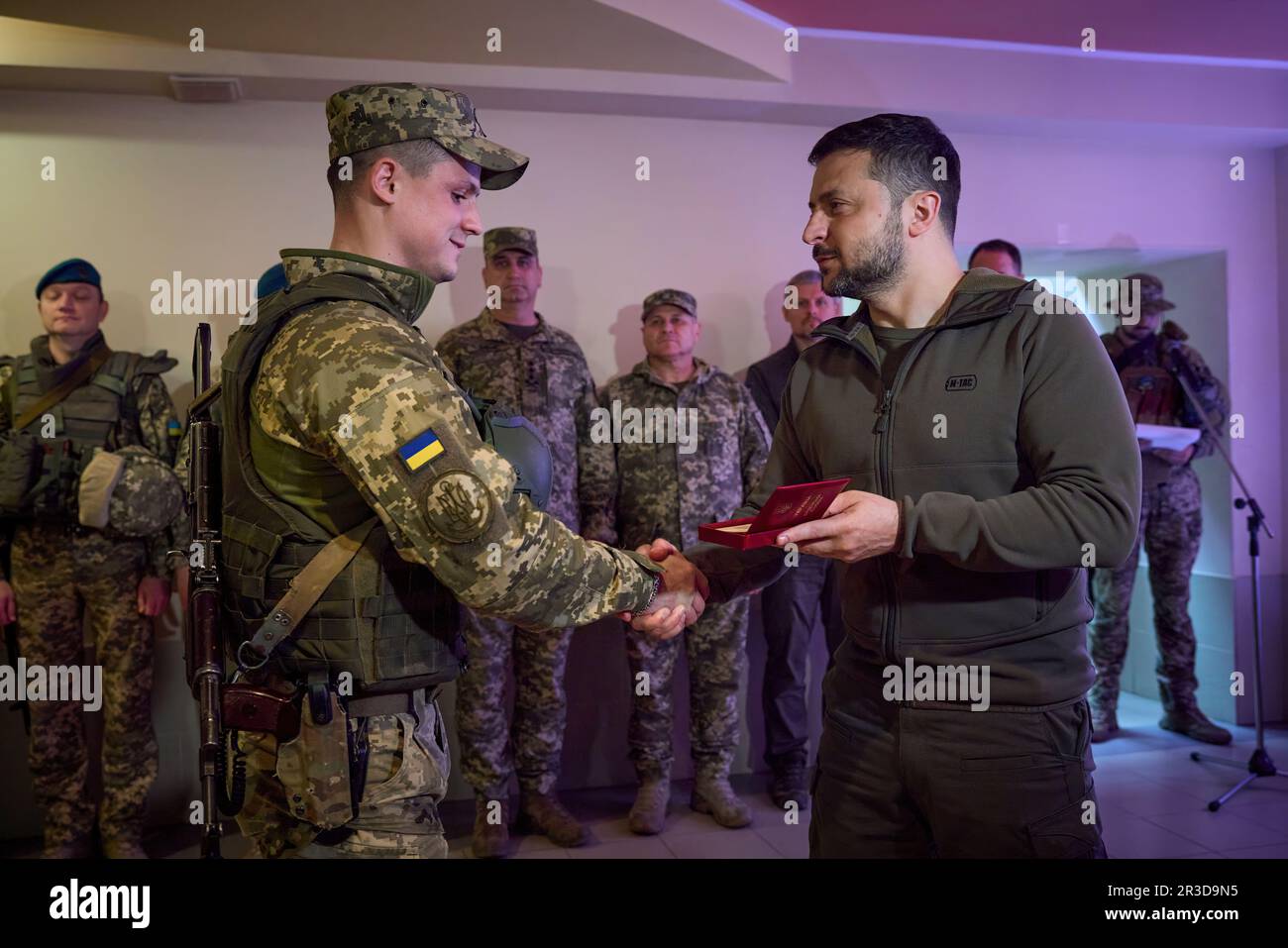 Having returned from a visit abroad, Ukraine President Volodymyr Zelensky visited the frontline positions of the Armed Forces of Ukraine in the Vuhledar – Maryinka defense area in the Donetsk region on the occasion of the Day of the Marines.   The Supreme Commander-in-Chief listened to the report by Lieutenant General Yuriy Sodol, Commander of the Marines and the Donetsk Operational Tactical Group, on the current situation in the designated area of the frontline.  The President spoke to the Ukrainian warriors and took part in the festivities. (Photo: Ukraine Presidential Office) Stock Photo