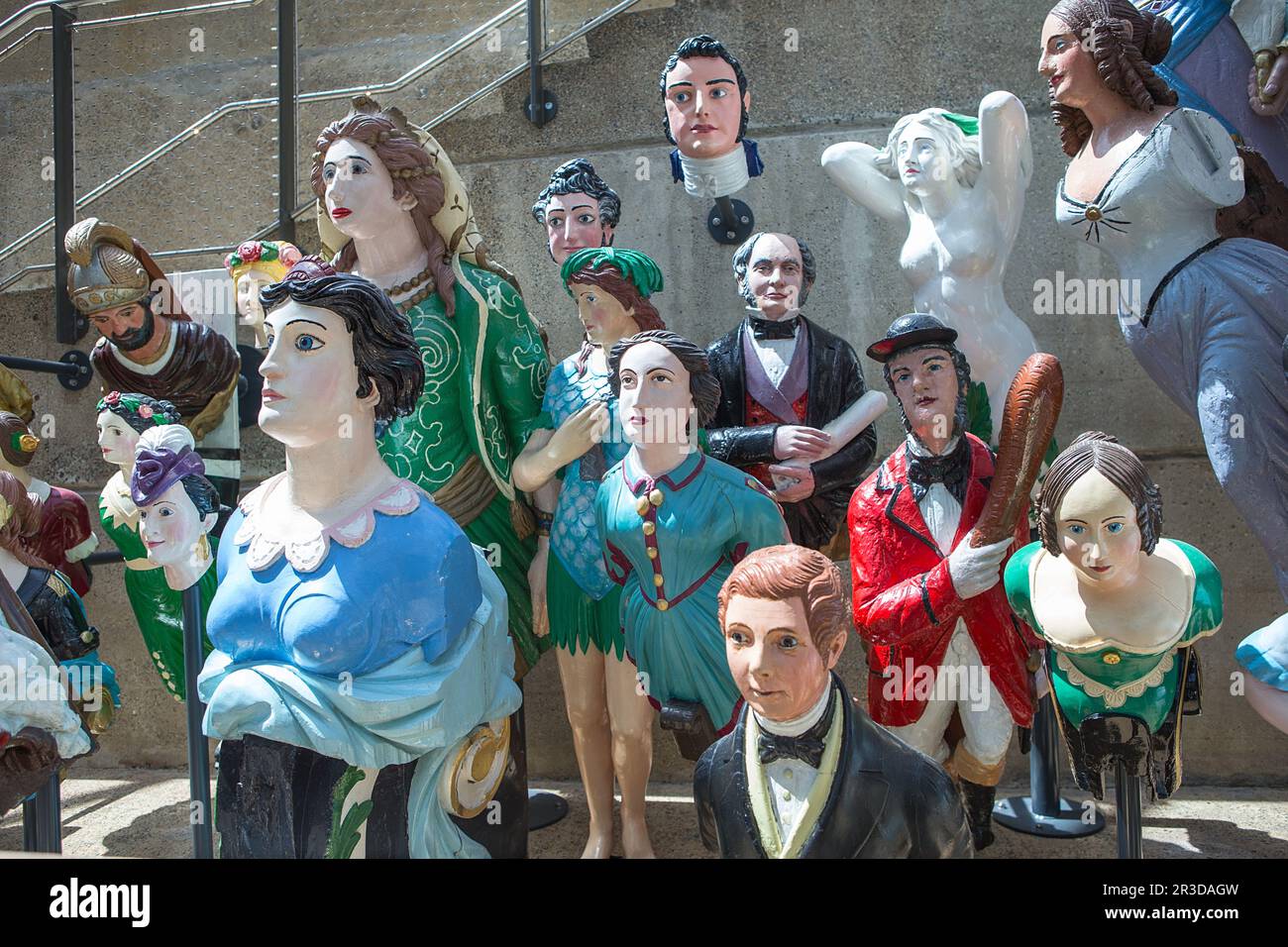 LONDON, UK - JUNE 29, 2019 A gorgeous collection of colorful ship figureheads on Cutty Sark  ship in Stock Photo