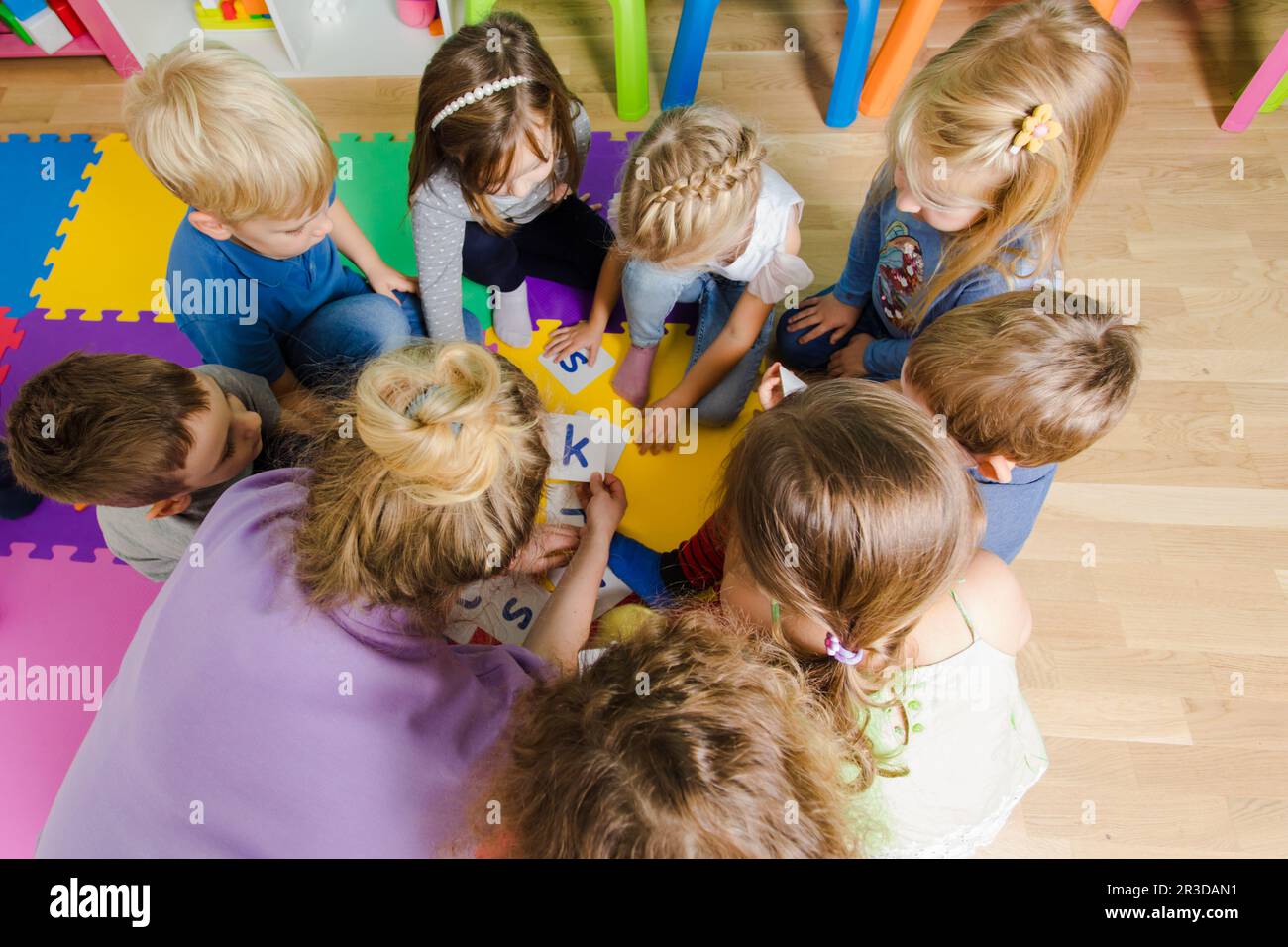 Educational group activity at the kindergarten or daycare Stock Photo