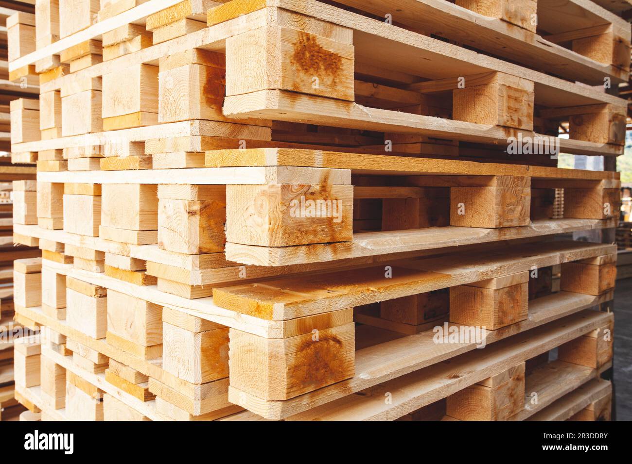 The pallets are located in the middle of the warehouse Stock Photo