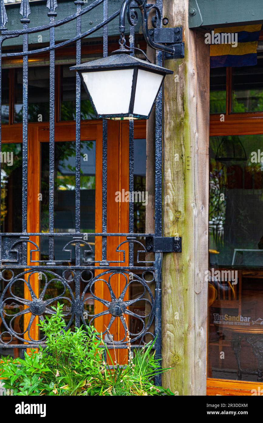 Wrought iron gates and a lamp on Granville Island in Vancouver Canada