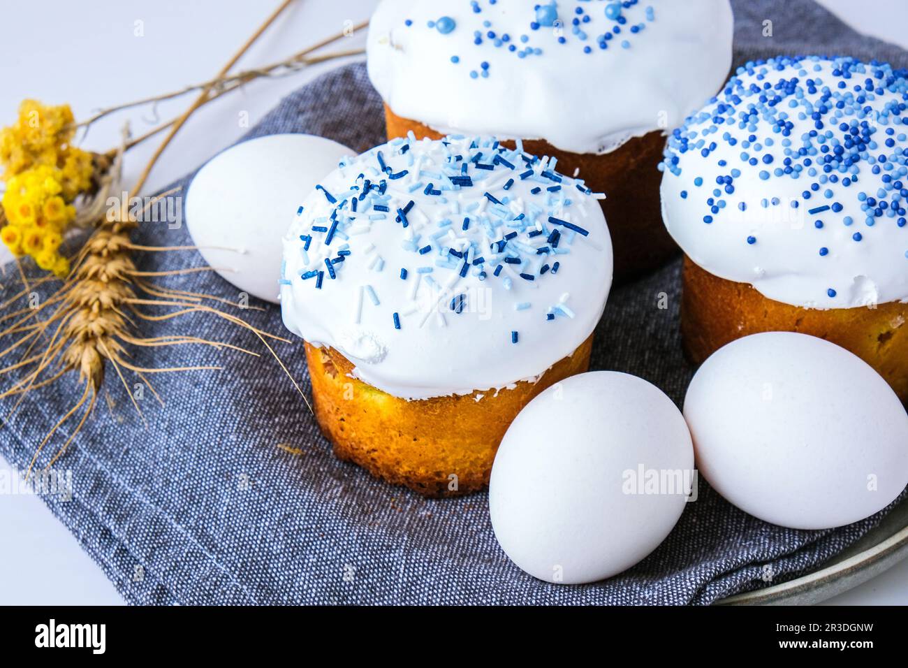 Easter eggs. Happy Day Bright Easter. Orthodox Easter holiday. Traditional food. Creative stylish trend Homemade easter cake. Se Stock Photo
