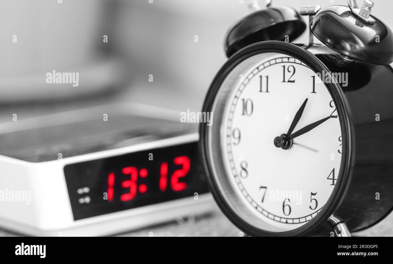 Classic and modern alarm clock Stock Photo