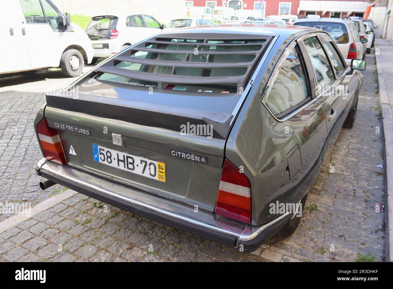 Citroen CX 25 TRD Turbo with its Kamm tail and stainless steel bumpers. A concave rear window is kept clear from rain without requiring a rear wiper. Stock Photo