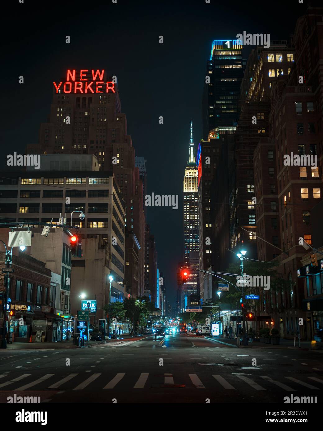 The New Yorker Hotel and 34th Street at night, Manhattan, New York Stock Photo