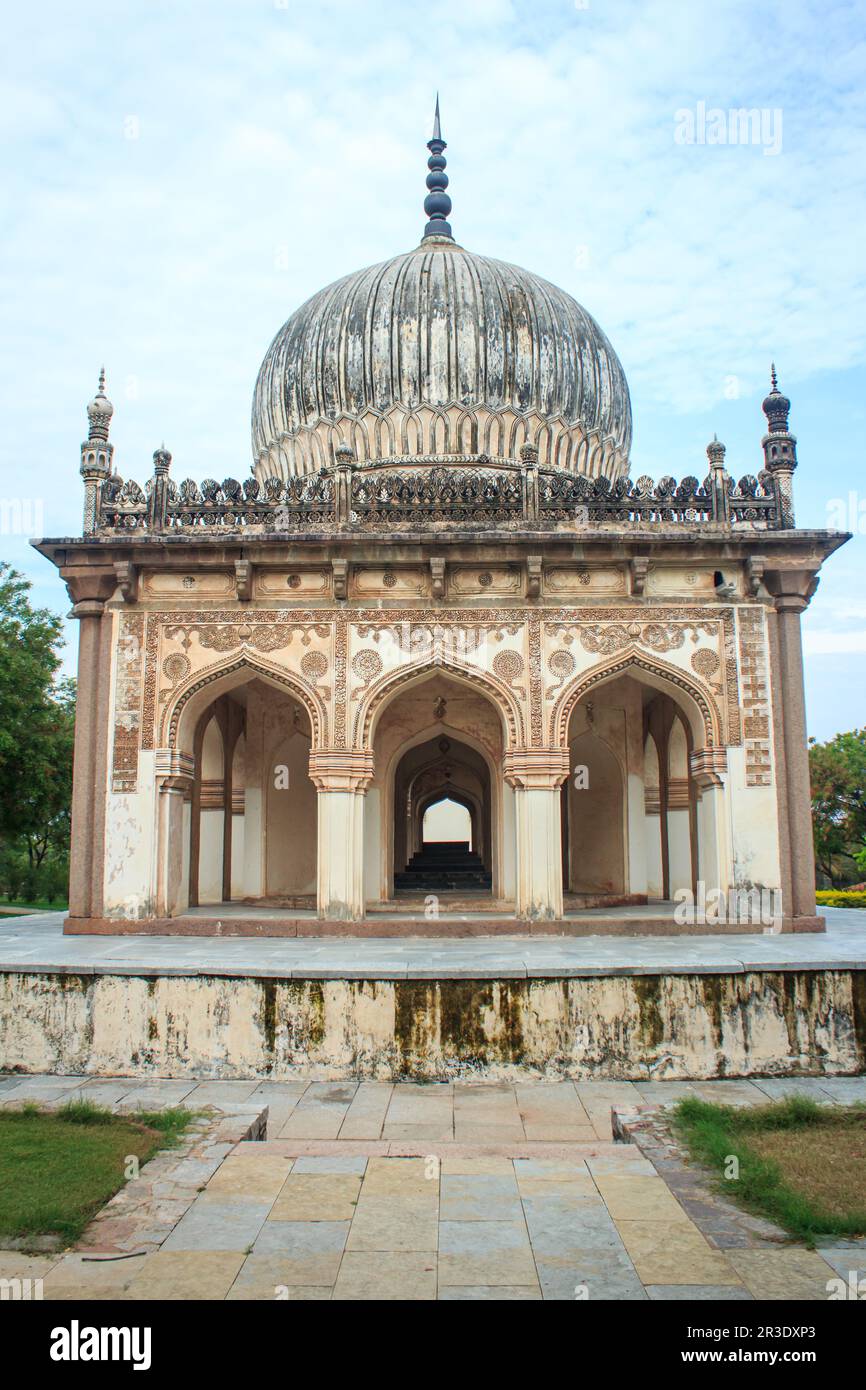 Historic tomb building with landscaped garden in Qutb Shahi ...