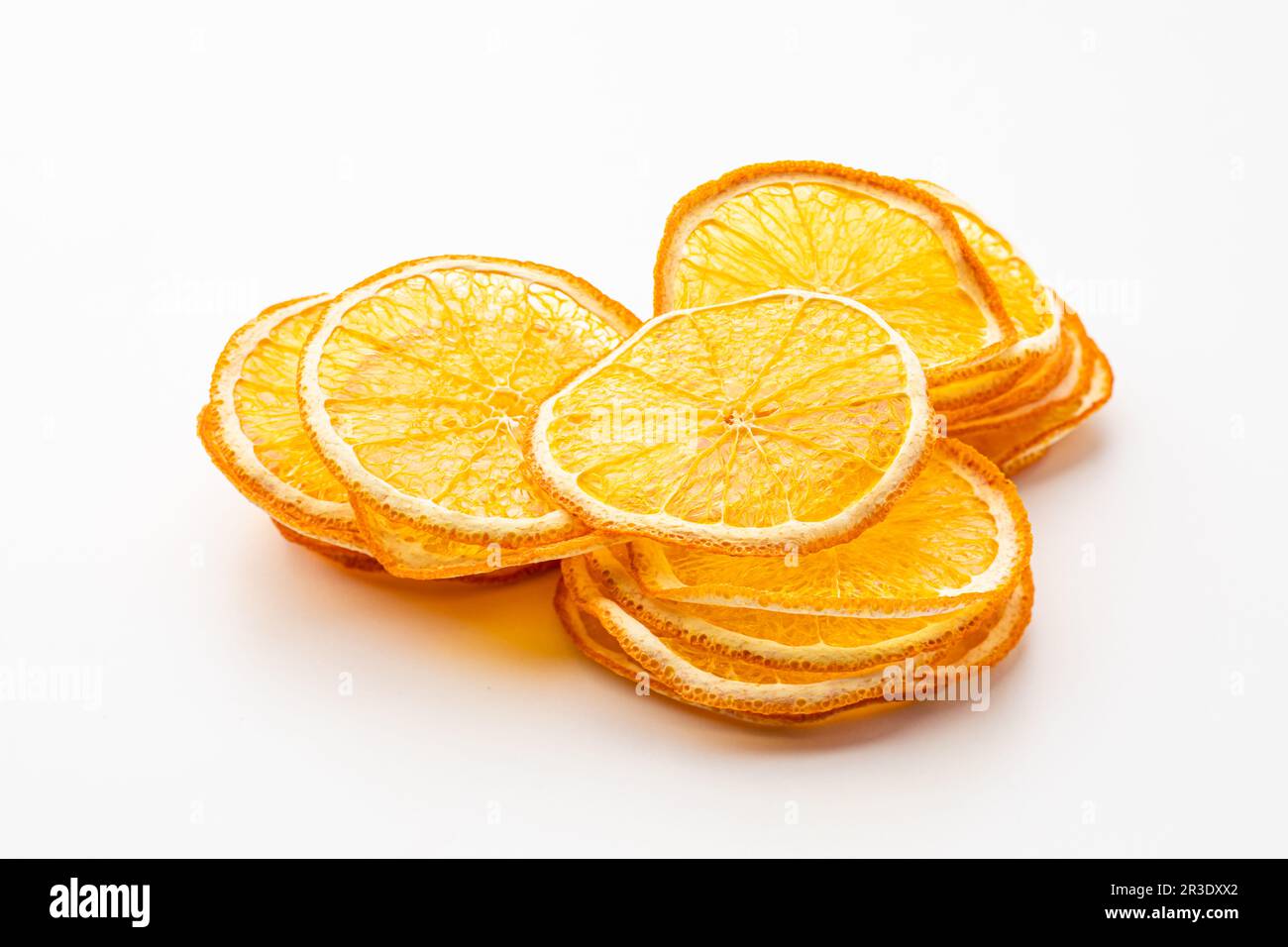 Orange dried fruits heap close up isolated Stock Photo - Alamy