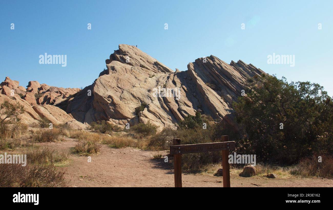 Vasquez Rocks Natural Area and Nature Center Sign and Rock Climb Stock Photo