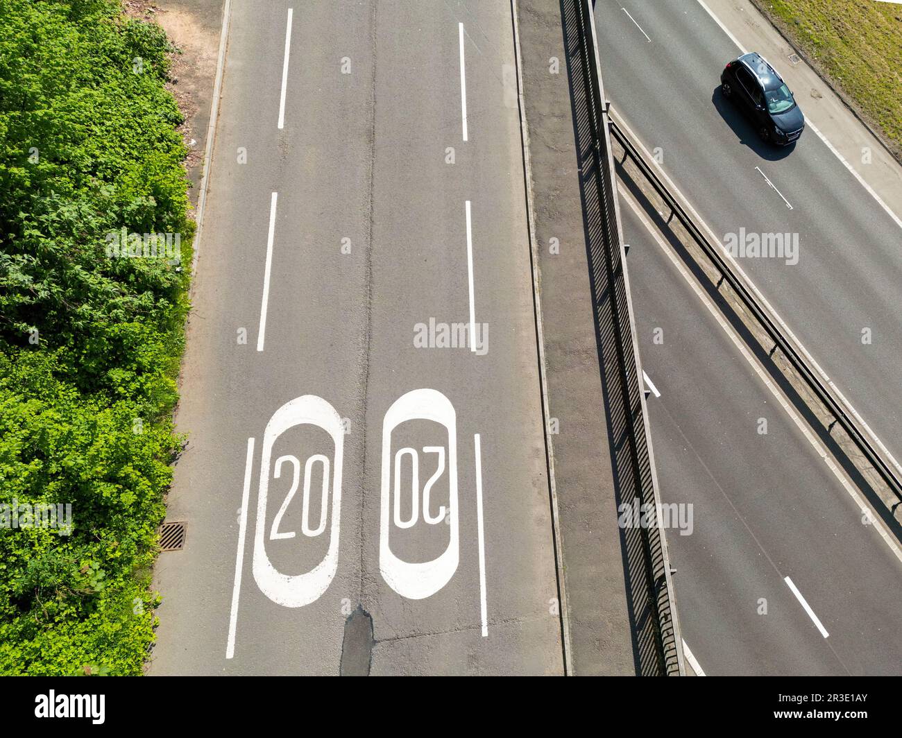 Taffs Well, Cardiff, Wales - May 2023: Aerial view of road markings for a 20 mph speed limit zone on a bridge over a fast dual carriageway Stock Photo