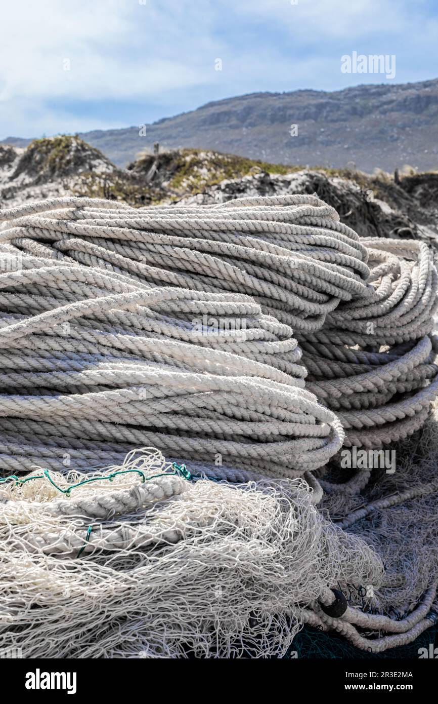 Boat Rope Net Traditional fishing net and rope on small rowing boat Stock Photo - Alamy