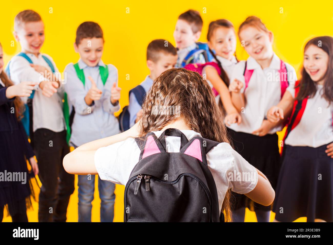 School girl being bullied by classmates. School bullying concept Stock Photo