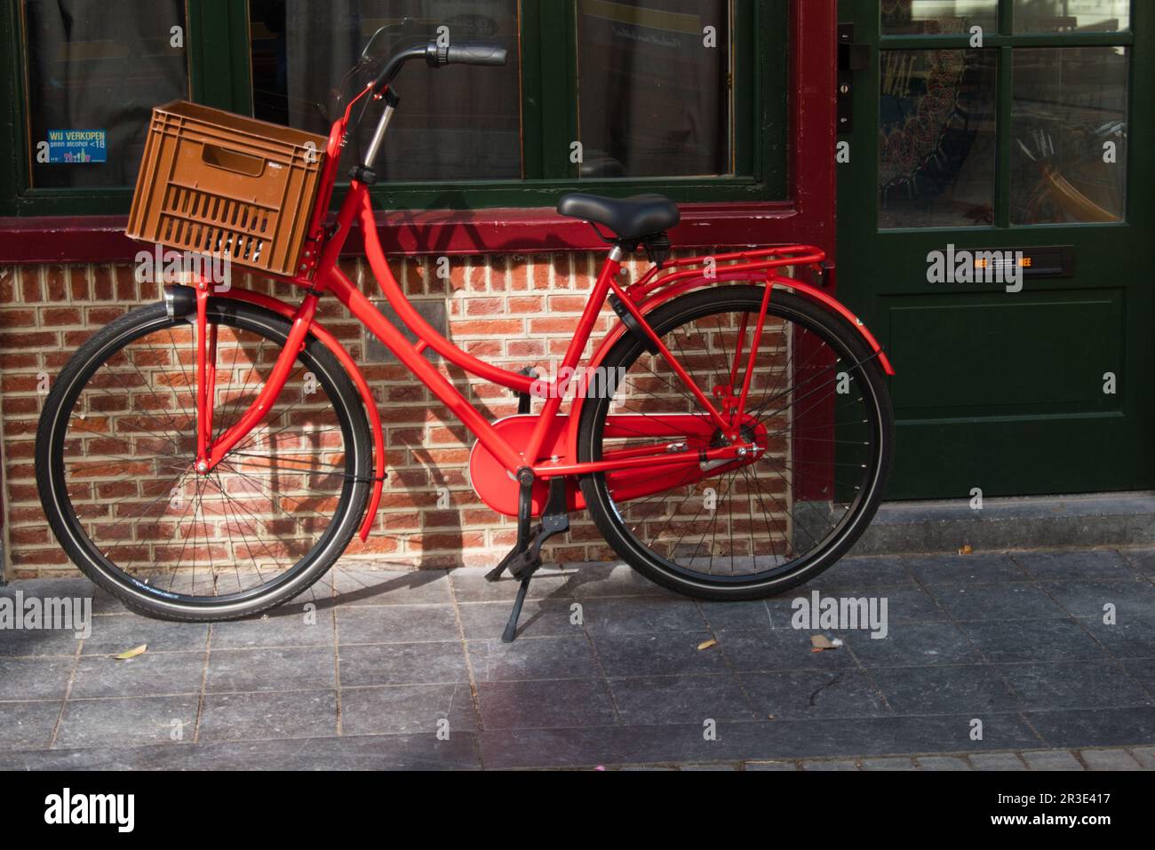 red bike in the netherlands in front of  a house, Stock Photo