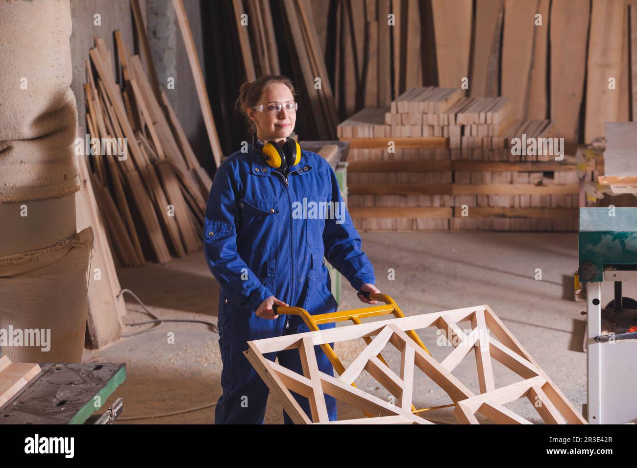 Piece of carved wood on hand truck Stock Photo