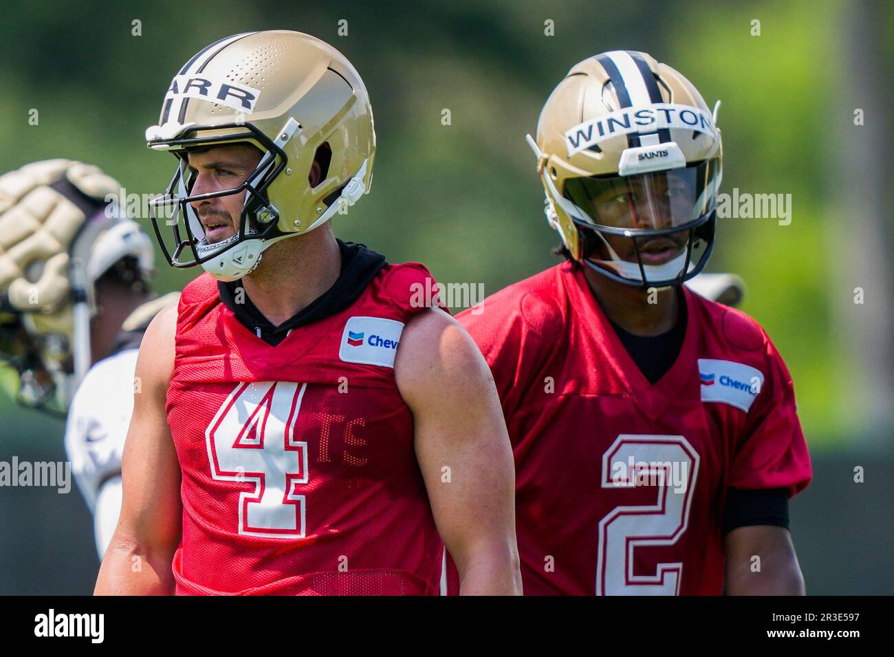 New Orleans Saints quarterbacks Derek Carr (4) and Jameis Winston (2