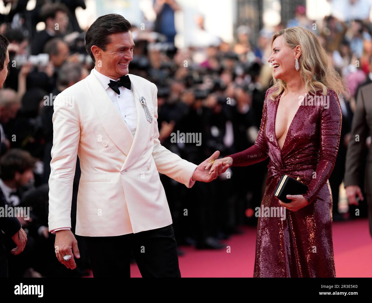 Rupert Friend, left, and Aimee Mullins pose for photographers upon ...