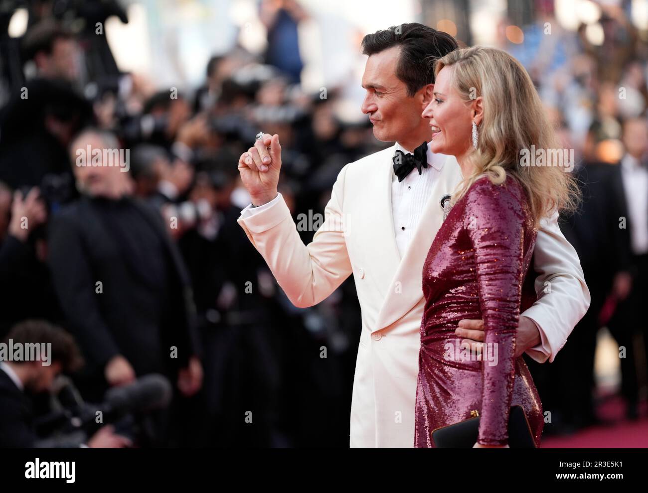 Rupert Friend, left, and Aimee Mullins pose for photographers upon ...