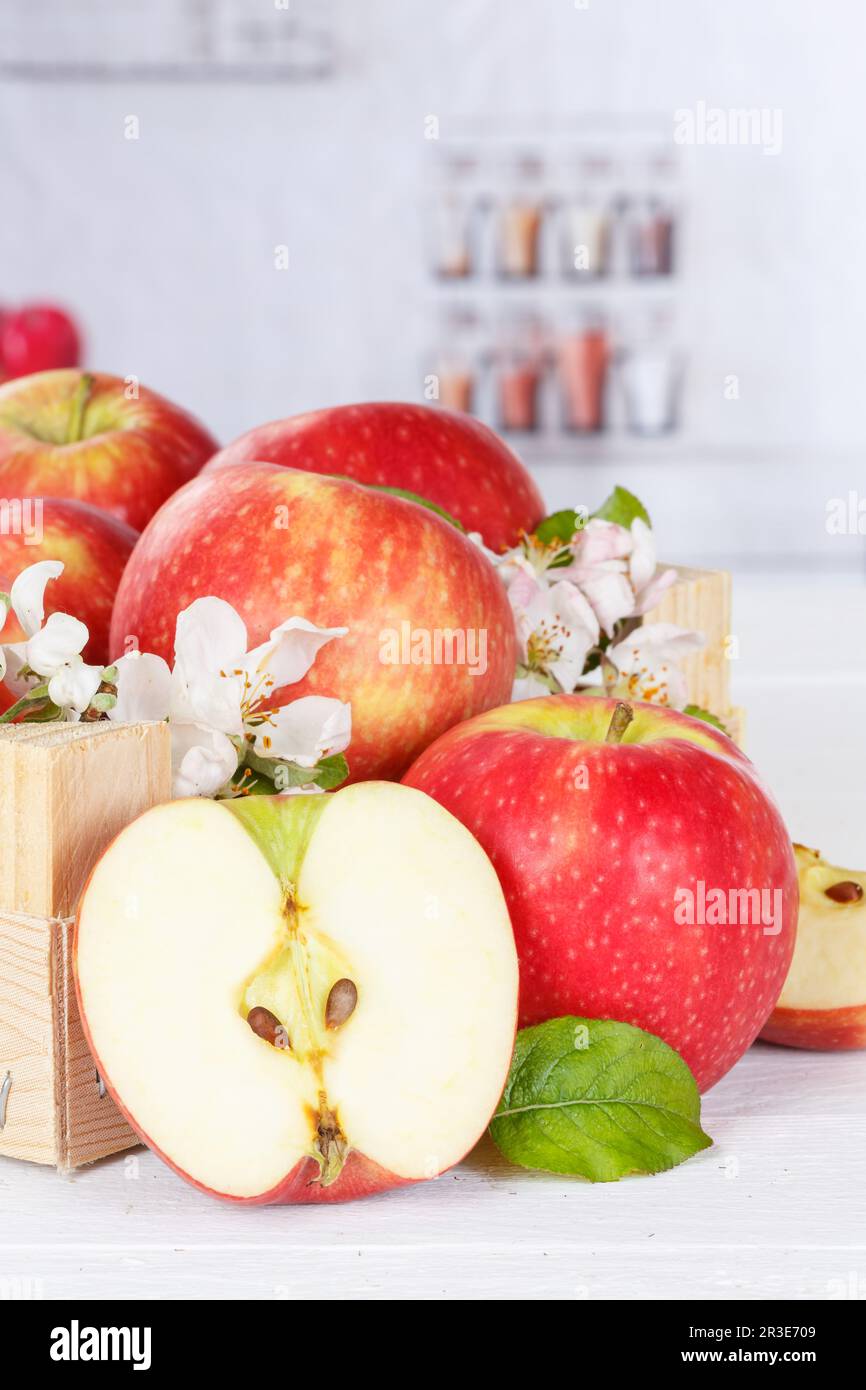 Apples fruits red apple fruit box on wooden board portrait with flowers
