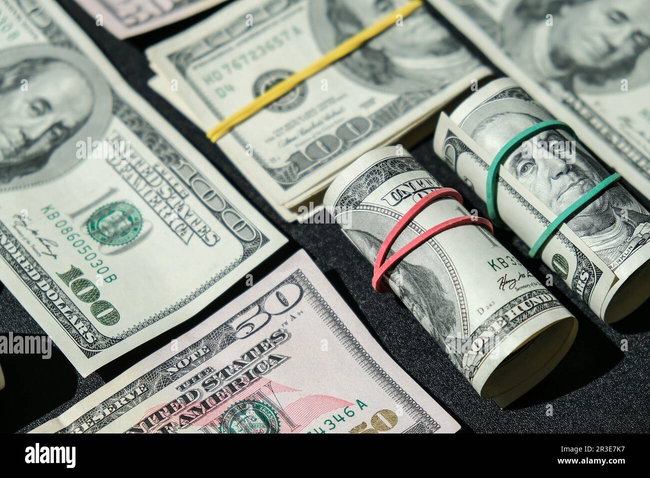 US dollars bundle close up isolated on dollar background. Paper