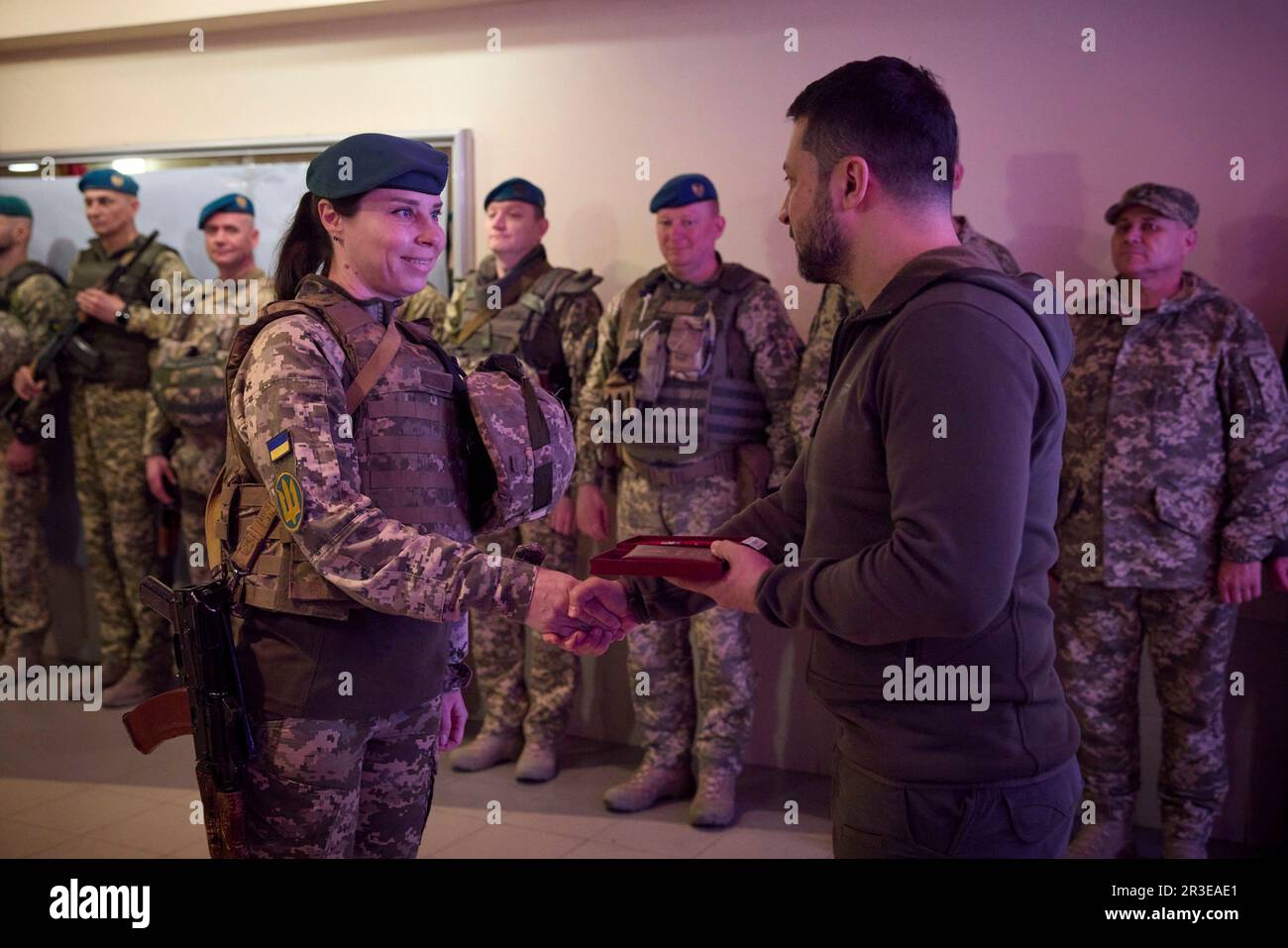 Vuhledar, Ukraine. 23rd May, 2023. Ukrainian President Volodymyr Zelenskyy, right, awards state medals to Ukraine Marines during a visit to frontline positions in the Donetsk region, May 23, 2023 in Vuhledar, Donetsk Oblast, Ukraine. Zelenskyy visited the troops to celebrate the Day of the Marines. Credit: Pool Photo/Ukrainian Presidential Press Office/Alamy Live News Stock Photo