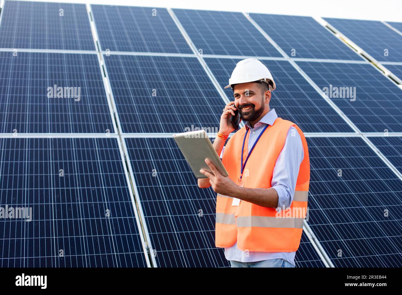 Tablet Using Solar Panel Solar panel technician using tablet hi-res stock photography and images ...