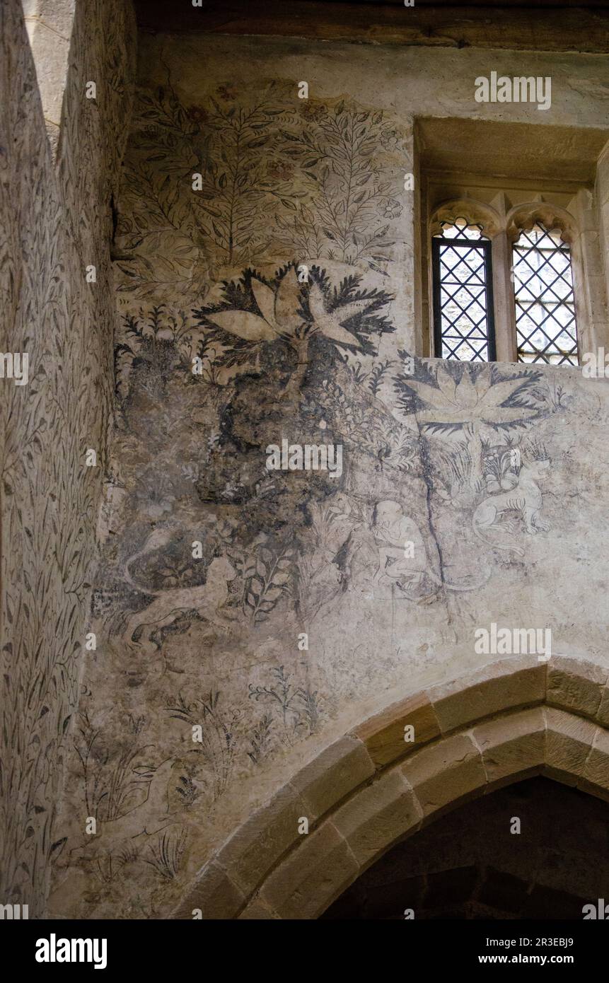 Wall paintings, fresco seccoes, in Haddon Hall Chapel, Bakewell, Peak District, Derbyshire, UK Stock Photo