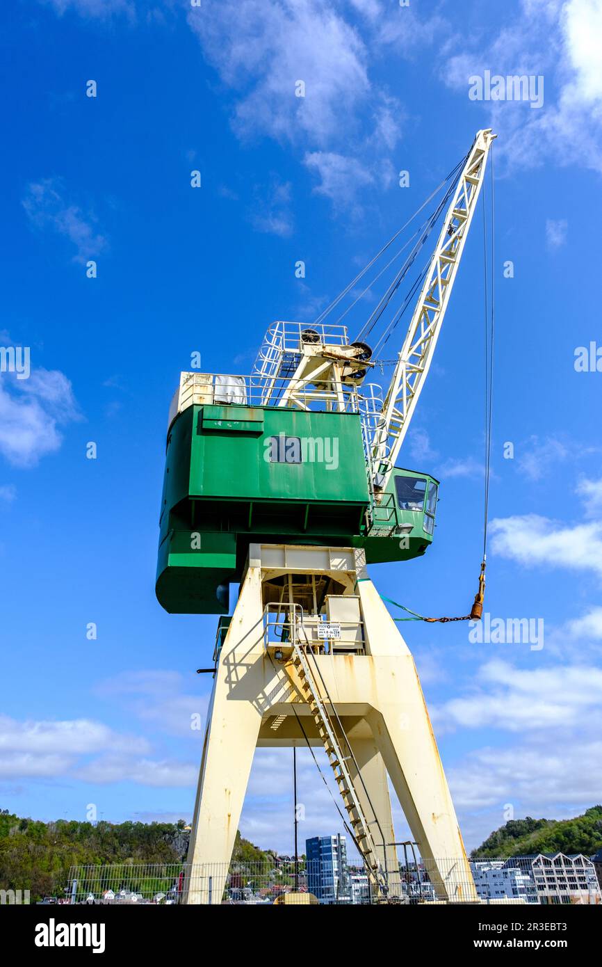 Sandnes, Norway, May 17 2023, Heavy Lift Industrial Dockside Crane Against A Blue Sky And No People Stock Photo