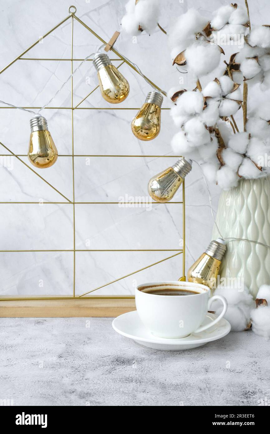 White home office room interior, bloggers workplace. Cup of coffee