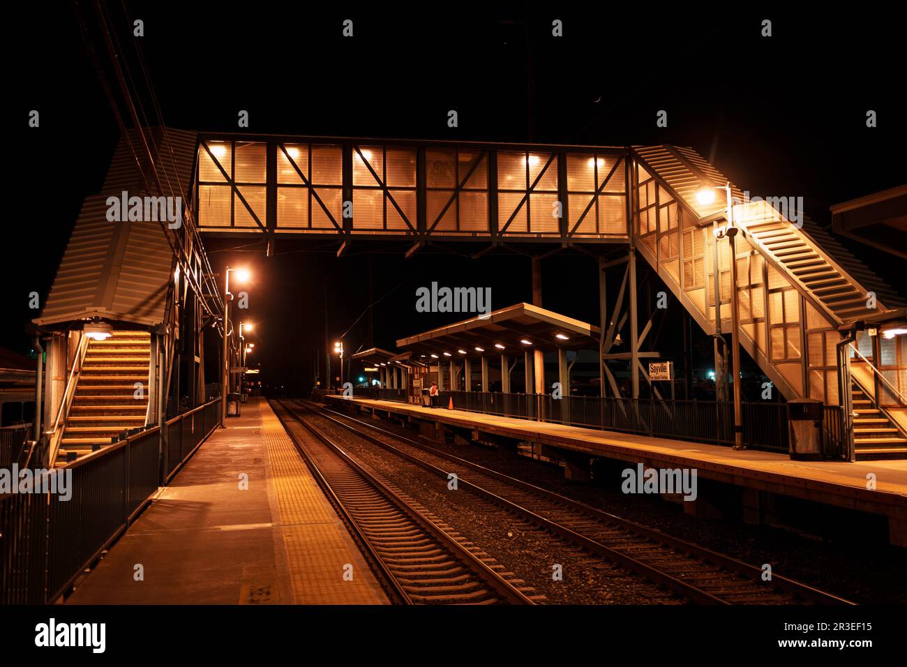 Long Island Railroad station at night, Sayville, New York Stock Photo