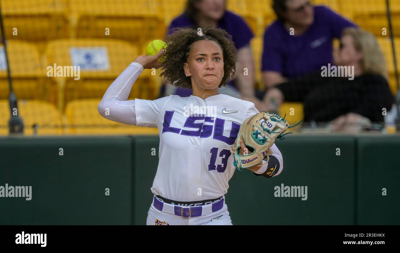 LSU infielder Danieca Coffey (13) throws during an NCAA softball game