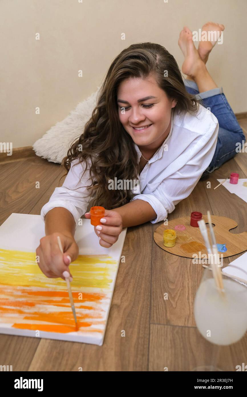 Creative painter in working process. Artist workplace, hobby, craft