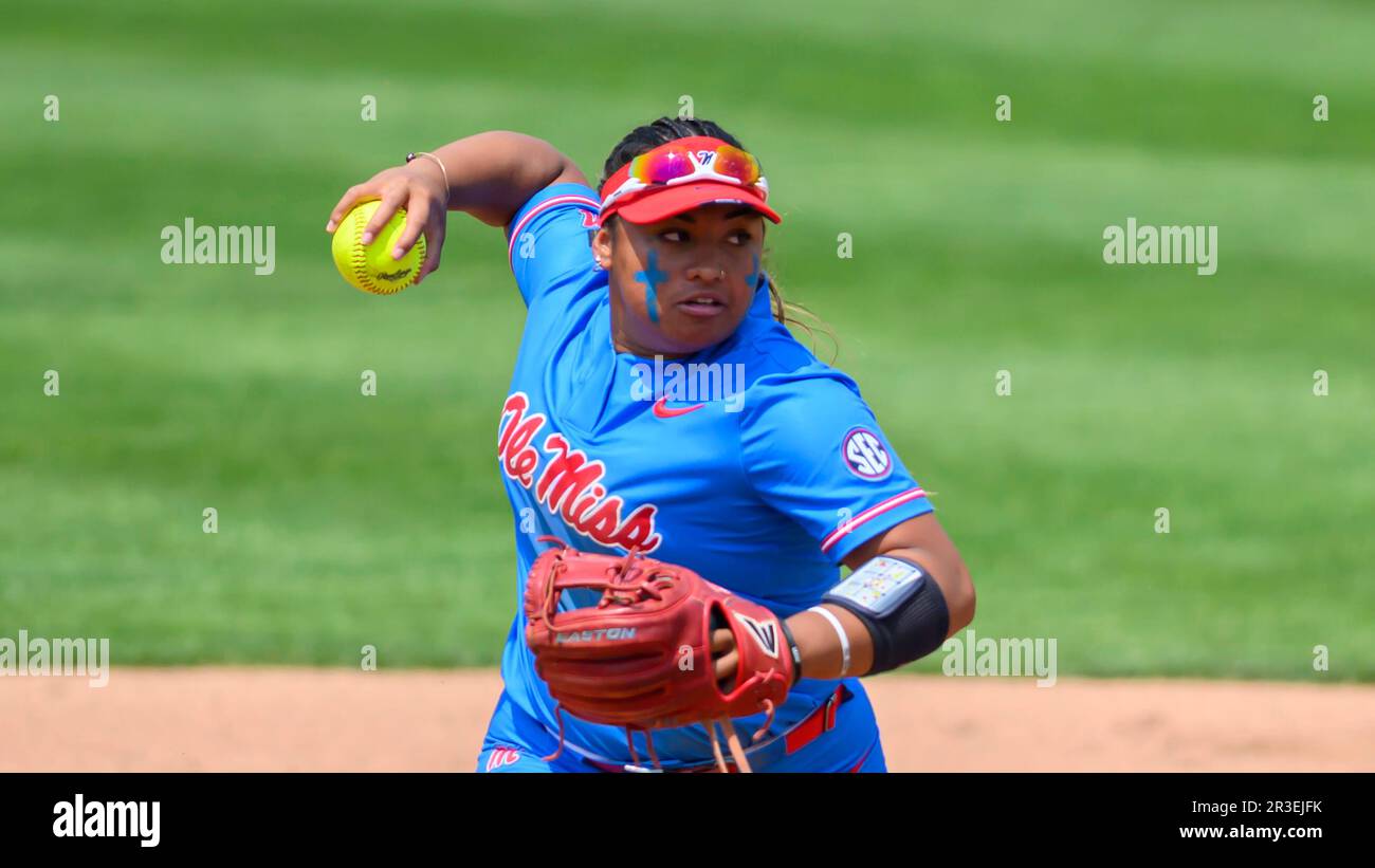 Ole Miss infielder Keila Kamoku (3) throws the ball to first base