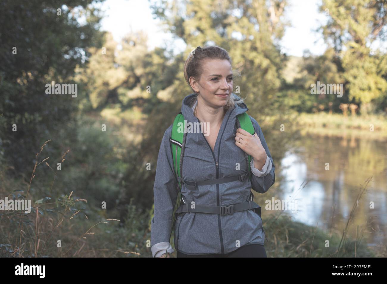 Beautiful woman hiking leaves hi-res stock photography and images - Alamy