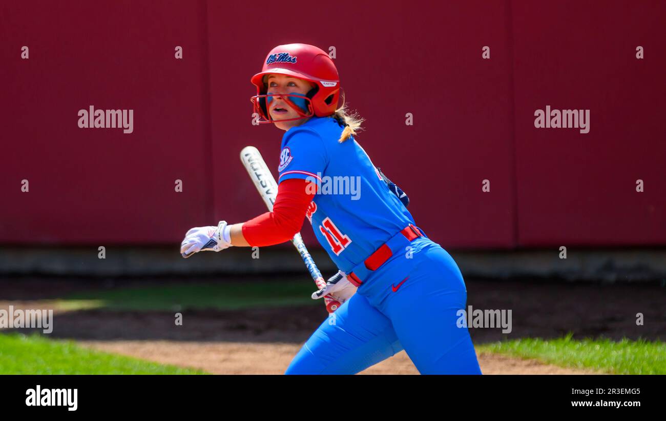 Ole Miss outfielder Tate Whitley (11) runs to first base after her at