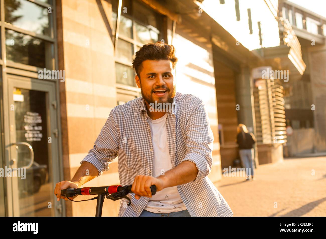 Male rides electric scooter hi-res stock photography and images - Alamy