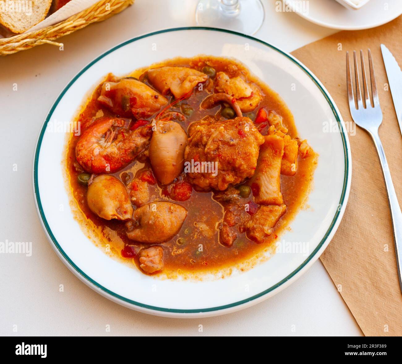 Spanish seafood zarzuela with fish, sea molluscs and crustaceans Stock
