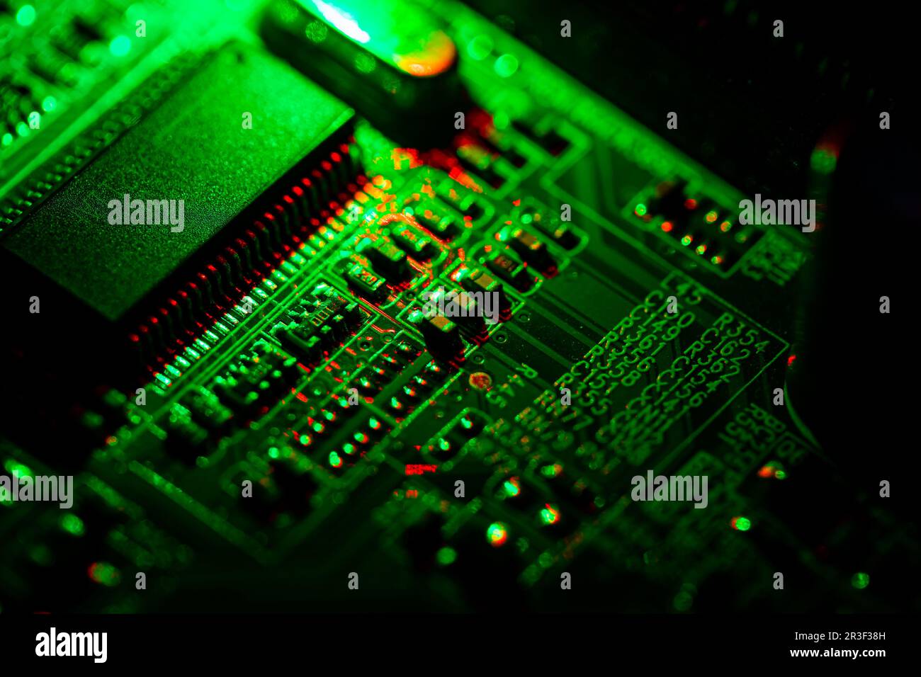 Close up of components and microchips on PC circuit board. Stock Photo