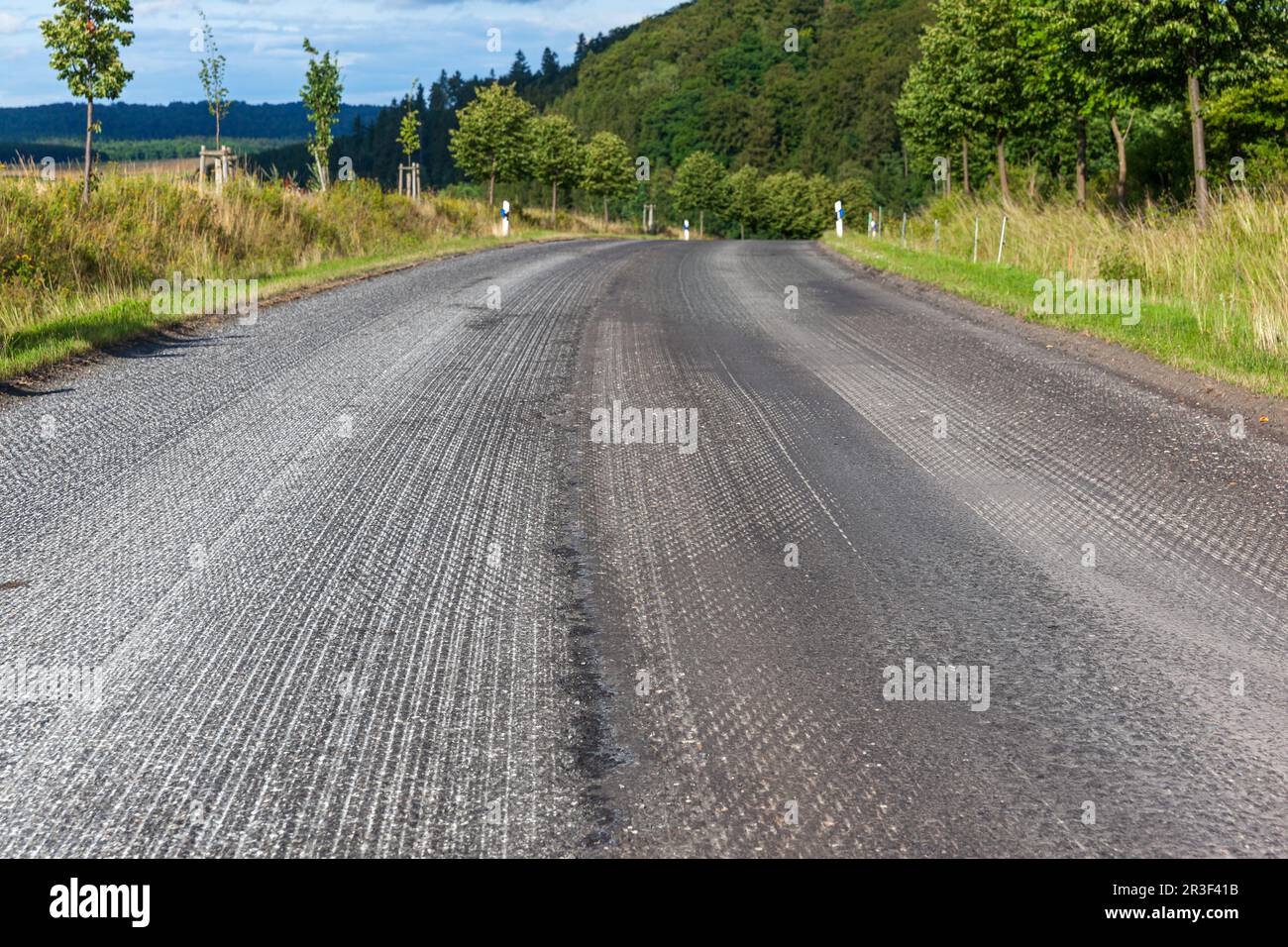 Milled road surface renewal bituminous surface Stock Photo