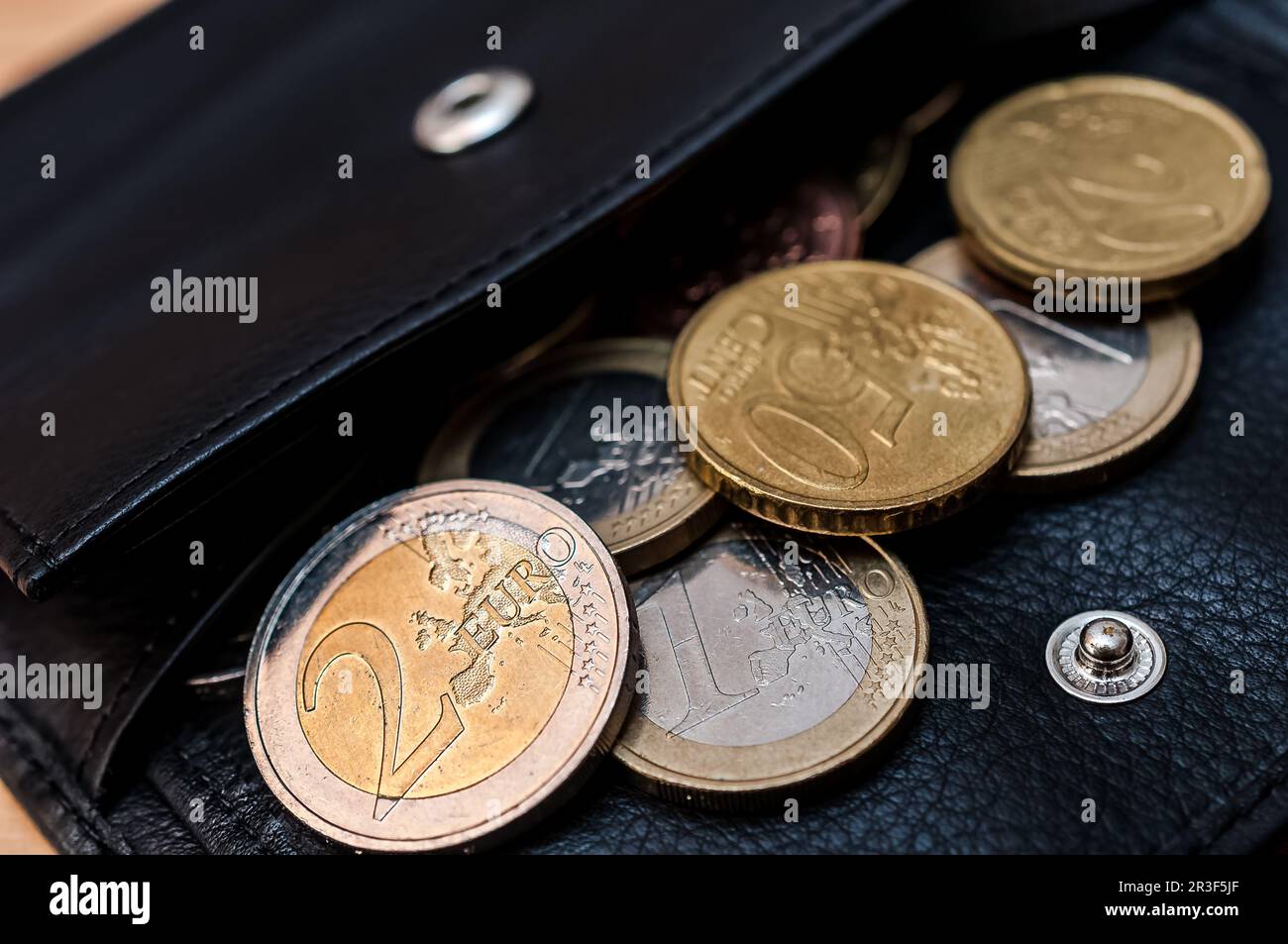 Wallet with euro money coins Stock Photo
