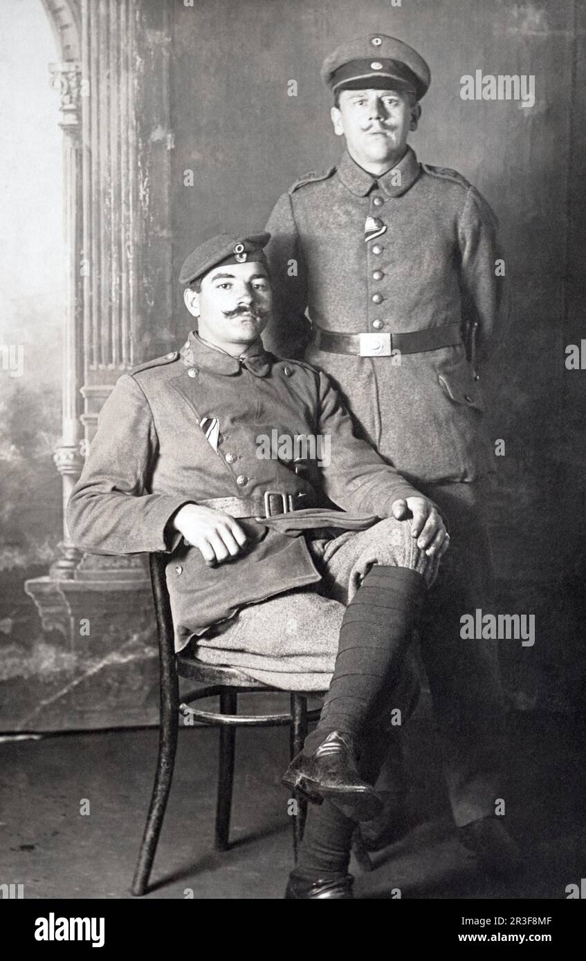 Two First World War German soldiers, an infantryman and cavalryman, with the medal of the Iron Cross. Taken in Munich. Stock Photo