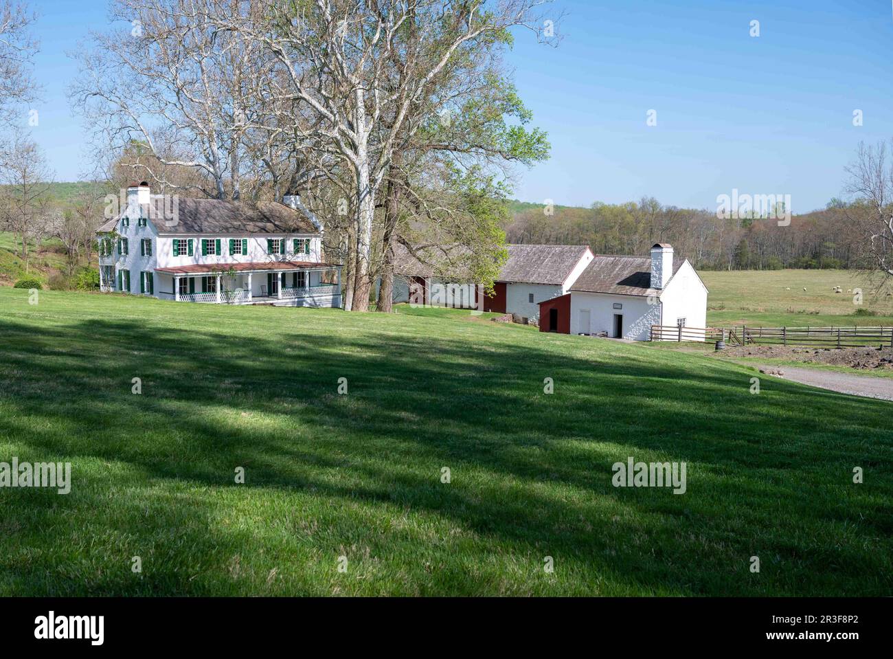 Rural colonial American village scene landscape stone buildings Stock